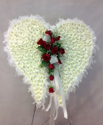 Angel Wings With Red Roses Standing Spray from Carl Johnsen Florist in Beaumont, TX