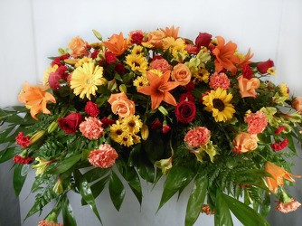 Burst Of Orange Casket Cover  from Carl Johnsen Florist in Beaumont, TX