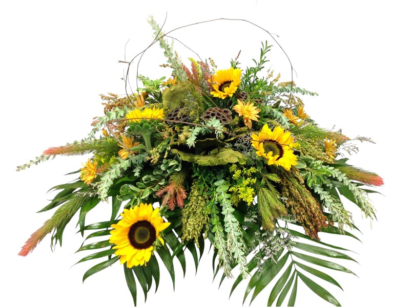 Sunflower Fields Casket Spray from Carl Johnsen Florist in Beaumont, TX