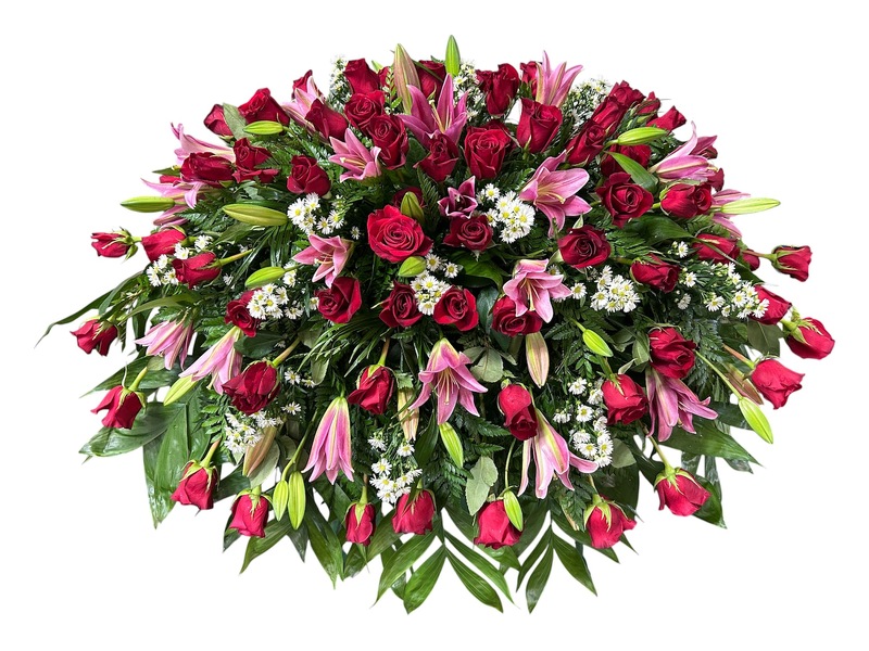 Roses and Lilies Casket Cover from Carl Johnsen Florist in Beaumont, TX