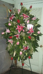 Roses and Stargazers Standing Spray  from Carl Johnsen Florist in Beaumont, TX
