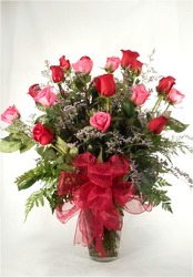 Two Dozen Red And Pink Roses from Carl Johnsen Florist in Beaumont, TX